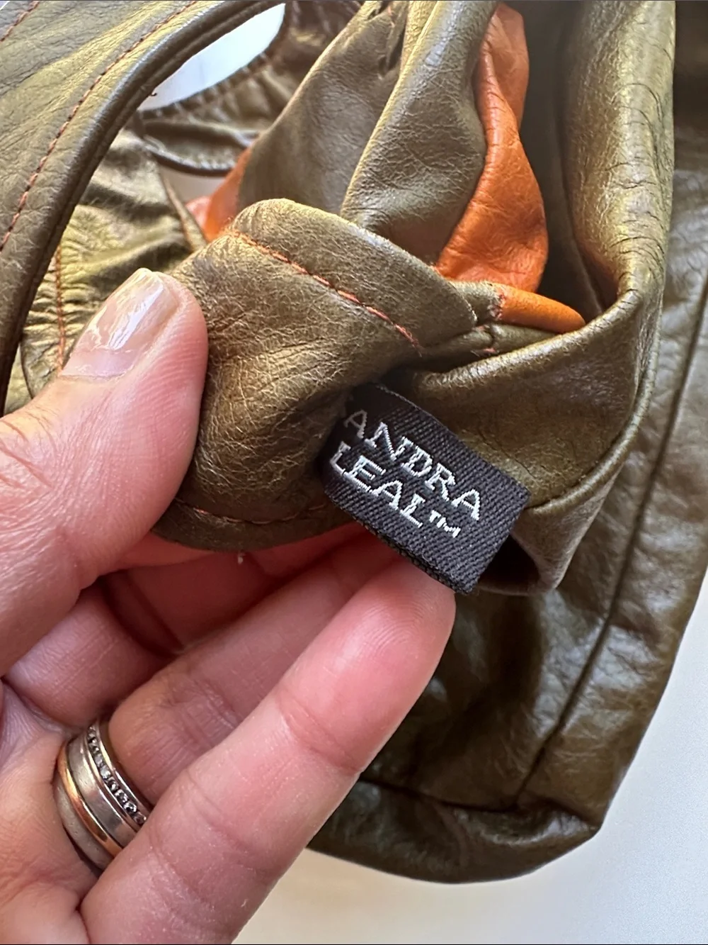 Sandra Lea Leather Messenger Bag with Orange 'L' Accent